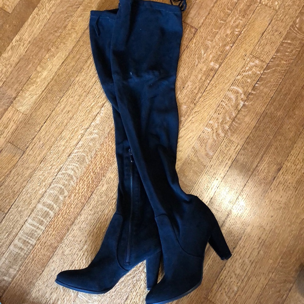 Thigh high black boots